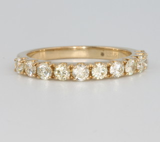 A 9ct yellow gold diamond half eternity ring approx. 0.76ct, size L 1/2