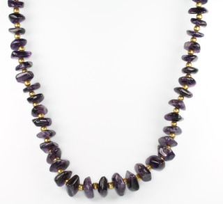 An amethyst bead necklace, 60cm 