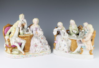 A pair of 20th Century German porcelain conversation groups of chess and card players 21cm 