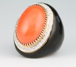 A good Vintage 18ct yellow gold coral, diamond and black enamel dress ring, the centre cabochon cut stone approx. 24mm x 17mm surrounded by 36 brilliant cut diamonds approx. 1.1ct, size N 1/2