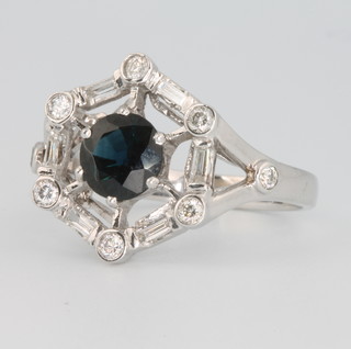 An 18ct white gold hexagonal shaped sapphire and diamond ring size R 