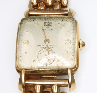 Rolex, a gentleman's 1930's 9ct yellow gold square cased Rolex wristwatch with seconds at 6 o'clock, the case 25mm x 25mm, no. 417829 the inside of case no. 4471 the movement no. E49183 on a 9ct yellow gold expanding bracelet 