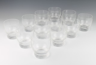 Twelve glass tumblers with hobnail bases 9cm 