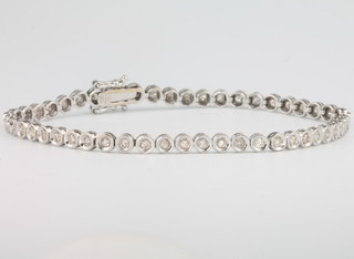 An 18ct white gold diamond bracelet comprising 50 brilliant cut stones 17.5cm 