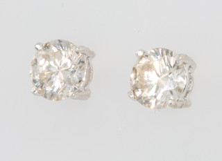 A pair of 18ct white gold single stone diamond brilliant cut ear studs, approx. 2.35ct