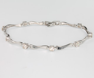 A 14ct white gold diamond set bracelet, 17.5cm, approx. 1.5ct 
