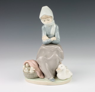 A Lladro group of a goose girl, goslings and goose 20cm 