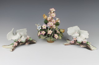 A pair of Capodimonte group of doves 18cm, a do. floral group 22cm 