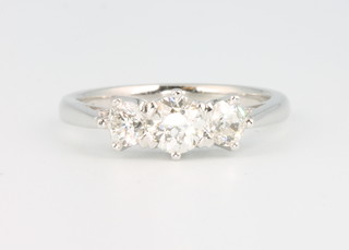 A platinum 3 stone diamond ring approx. 1ct, size O 