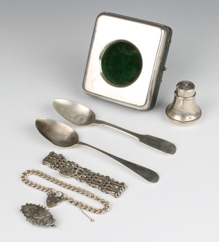 A silver pocket watch holder Birmingham 1914 9cm x 8cm, 2 spoons, 2 bracelets, a brooch and a condiment 