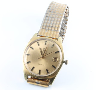 A gentleman's vintage gold plated Omega automatic calendar wristwatch on a later expanding bracelet 