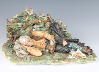 A Capodimonte figure of a sleeping tramp beside a wall by Cortese 19cm 