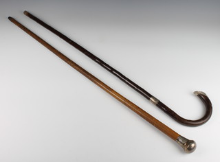 A silver mounted walking cane and a ditto walking stick 