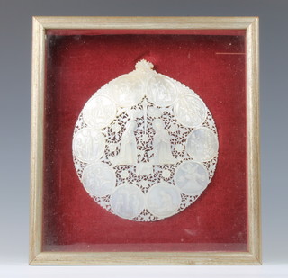 A 19th Century Continental carved and pierced mother of pearl shell with religious vignettes 16cm, framed