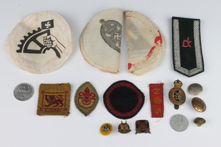 A Royal Horse Guards cap badge and minor cloth and other badges 