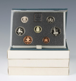 Four United Kingdom proof coin sets 1983/83/84 and 88 