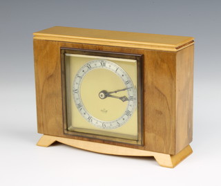 A 1950's Elliott mantel timepiece with gilt dial, silvered chapter ring and Roman numerals contained in a walnut case 19cm x 18cm x 5cm