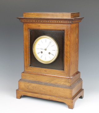 Hry Marr of Paris, a French 19th Century 8 day striking mantel clock with enamelled dial and Roman numerals, the dial signed H Y Marc Paris, contained in a rosewood case, raised on a stepped base  
