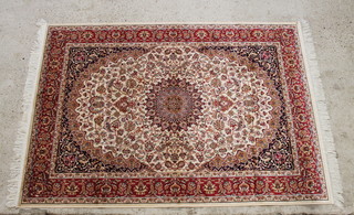A beige and red ground Belgian cotton Heriz rug with central medallion 190cm x 140cm 
