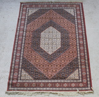 A beige and blue ground Belgian cotton Persian style rug 226cm x 161cm 
