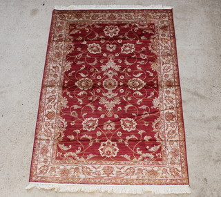A yellow and gold ground Zeigler Belgian cotton rug 230cm x 161cm 