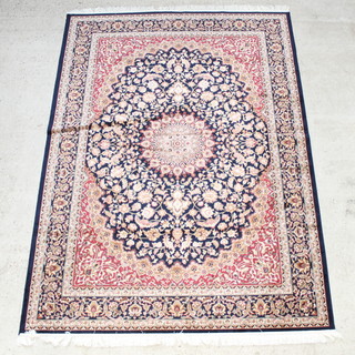 A blue and gold Kashan style Belgian cotton rug with central medallion 280cm x 200cm 