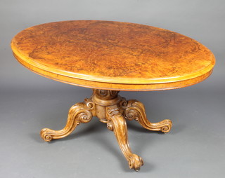 A Victorian oval figured walnut quarter veneer loo table raised on a bulbous carved column and tripod base 74cm h x 136cm d x 104cm w 