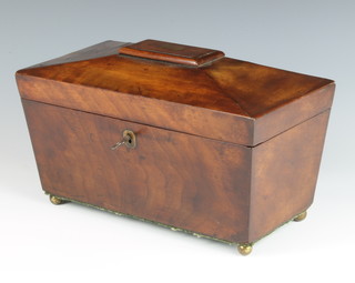 A Georgian mahogany twin compartment tea caddy of sarcophagus form 17cm h x 18cm w x 14cm d, complete with glass mixing/sugar bowl 
