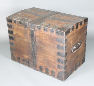 A Victorian oak and metal bound plate trunk with iron drop handles 67cm h x 91cm w x 57cm d 