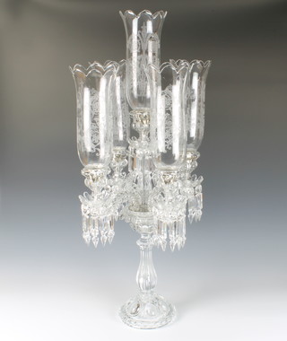 A modern Baccarat 5 light table candle holder with chased elongated and faceted lustre drops on a waisted baluster stem 86cm 