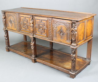 An impressive Victorian carved Continental oak 17th Century style dresser base, the top formed of 3 planks, fitted 2 long drawers with carved and geometric mouldings above cupboard and having carved figures, 62cm h x 182cm w x 58cm d 
