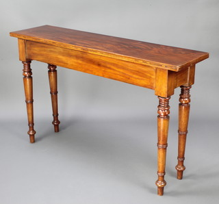 A rectangular mahogany console/side table raised on turned supports 85cm h x 140cm w x 38cm d 