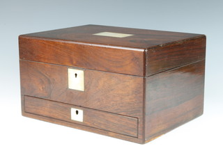 A Victorian rectangular rosewood vanity case with hinged lid, inlaid a mother of pearl panel, the interior fitted bottles 17cm h x 30cm w x 43cm d 