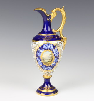 A Coalport ewer decorated with a mountainous Scottish Landscape the blue ground with gilt decoration 18.5cm  
