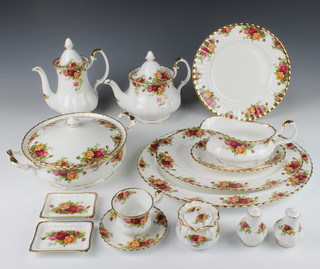 A Royal Albert Old Country Roses tea, coffee and dinner service comprising 9 coffee cups, 9 saucers, a coffee pot, a sugar bowl and cream jug, 8 tea cups, 11 saucers, 1 teapot, a sugar bowl and milk jug, 2 large cups, 8 soup bowls, 2 meat platters, 1 cake plate, 2 vegetable tureens with lids, 1 large vegetable dish, a salt and pepper, a gravy boat and stand, 8 dessert bowls, 9 dinner plates, 10 side plates, 16 dessert plates, 2 odd plates, 8 dessert bowls 