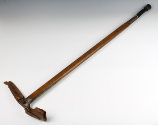 An Austrian steel and oak ice axe by Stubai and marked Mod.Walner 