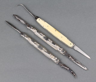 Three folding medical instruments including 1 ivory handled spring lockback stamped Fergusion 21 Giltspur Street 1846-69 and 2 slide lock handle stamped J Gray & Son Sheffield 
