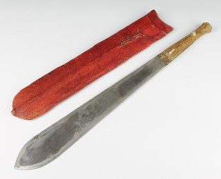 A 1950's Mau Mau Terrorist Panga machete with 35cm double edge blade contained in a red dyed scabbard, the knife handle skin covered 