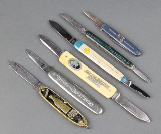 6 advertising/souvenir knives including a World Cup Sheffield 1966 knife stamped Joseph Rodgers, a British Empire Expo knife, a Bulldog Guinness knife stamped G C Shaw High Holborn  