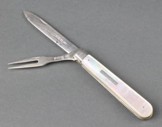 A silver and mother of pearl  interlocking fruit knife and fork Sheffield 1904 by William Needham 
