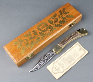 A Puma 1769 cased commemorative knife with stag horn handle and etched blade engraved with gold, complete with certificate no. 1269 of 1769 