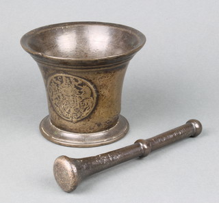 A Charles II bronze mortar and pestle, the mortar decorated The Royal Arms and with CR cypher 11cm h x 12cm diam., the base with old label marked Wingfield Castle Diss Norfolk 