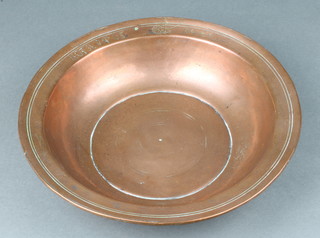 A 17th/18th Century "Persian" copper bowl, the rim with inscription 6cm h x 27cm  diam. 