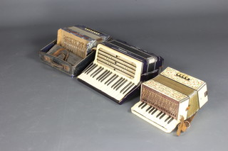A Hohner Student 1 accordion with 8 buttons, a Hohner Carmen 2 accordion with 24 buttons and an Alvari  accordion with 24 buttons 