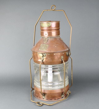 Seahorse, a copper and brass masthead lantern marked Anchor Seahorse GB25722 50cm h x 25cm diam. (converted for use with electricity) 