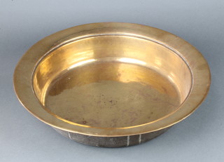 A circular brass bowl 9cm x 42cm 