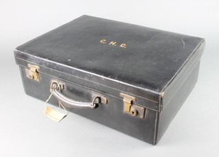 Edwards & Sons of 161 Regent Street, a black leather vanity case with brass mounts 17cm x 47cm x 36cm (no contents) 