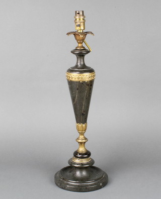 A polished granite and gilt metal table lamp, raised on a socle base 46cm h x 16cm w  