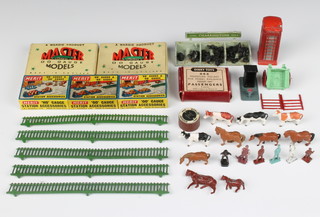 9 Master O gauge model sheep no.90 boxed, cable laying party no.35 comprising 2 wheel barrows and 6 figures of workmen boxed, 10 Dinky 053 miniature railway figures, 6 passengers, porter and 3 railwaymen boxed, metal phone box, various other miniature figures and fencing 