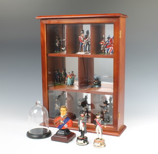 A DF Grive head and shoulders portrait bust - The Duke of Wellington, raised on a mahogany case 12cm x 5.5cm, a Britain figure of a standing Napoleon 10cm x 4cm, do. figure of a Nelson and a display cabinet containing a collection of painted military figures and 6 display domes